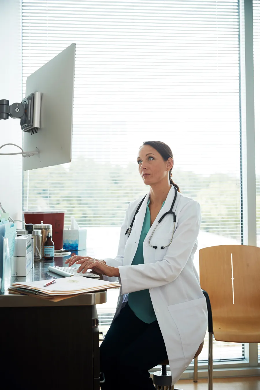 a person in a white coat