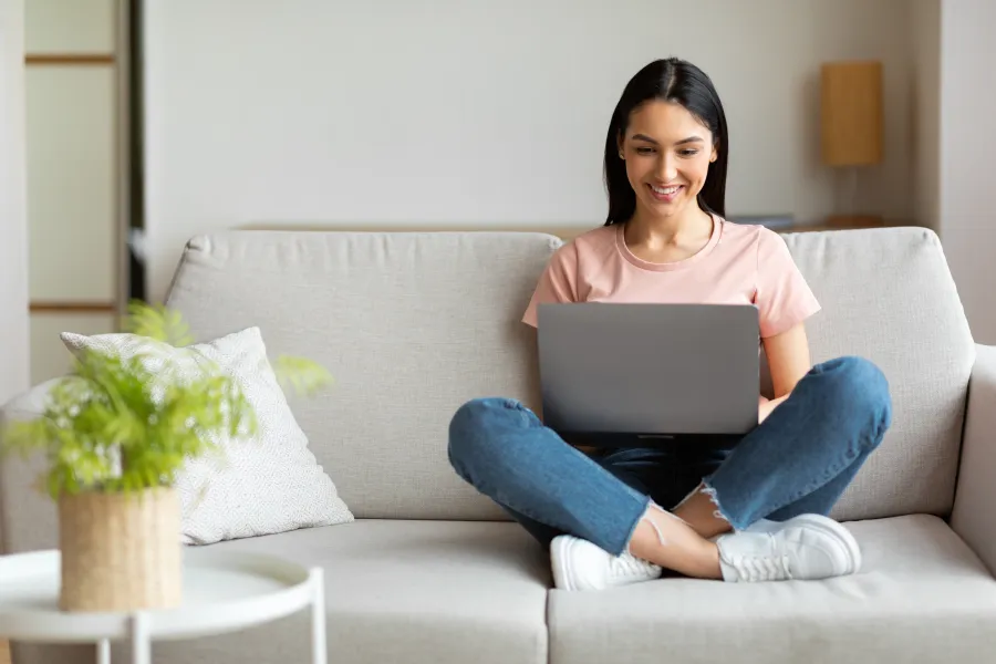 a woman sitting on a couch