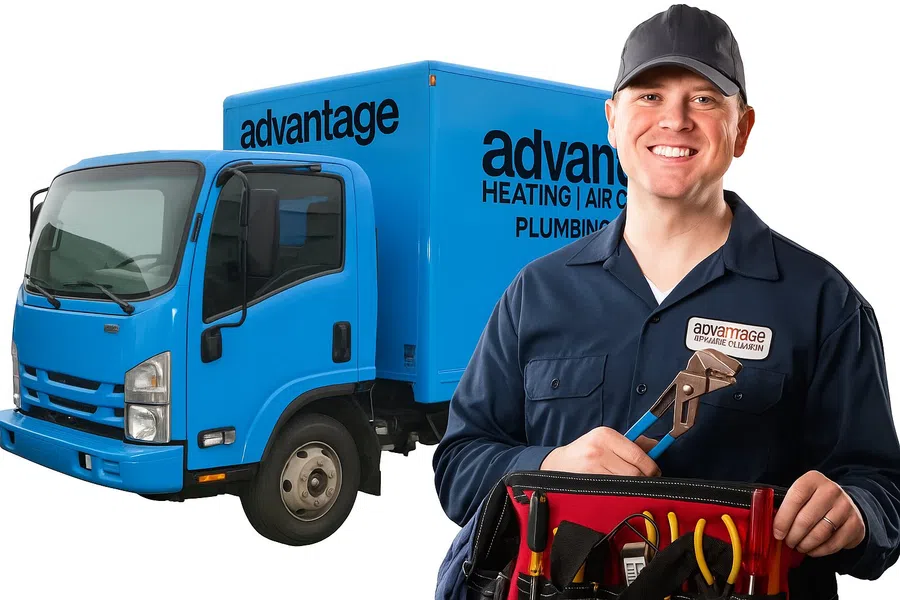 Smiling plumber holding tools next to a blue Advantage Heating, Air Conditioning, and Plumbing service truck