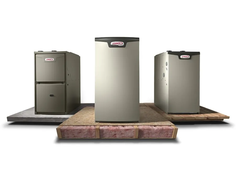 Three Lennox heating units displayed on insulation and wooden panels against white background.