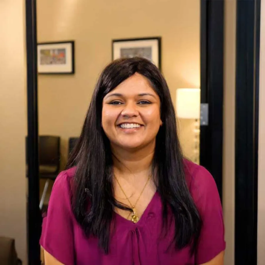 a woman smiling for the camera