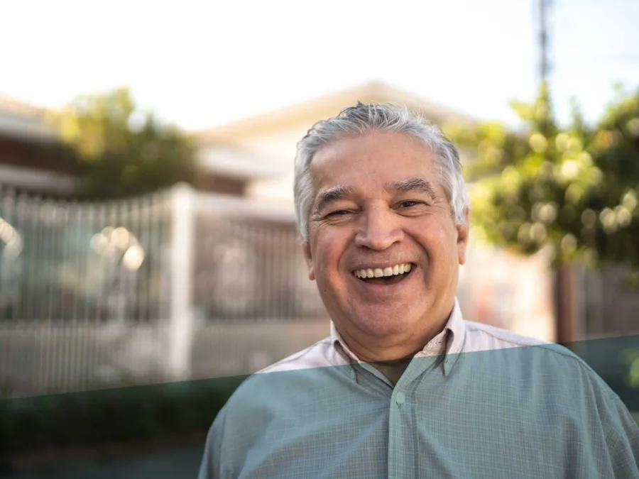 a man smiling outside