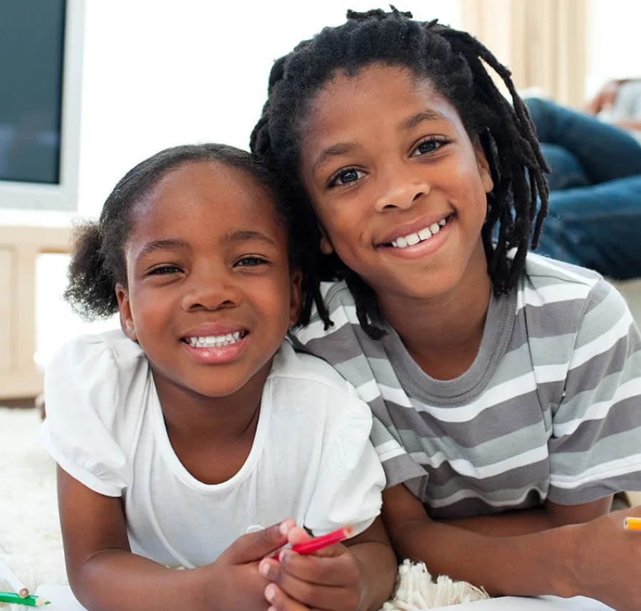 a person and a child smiling