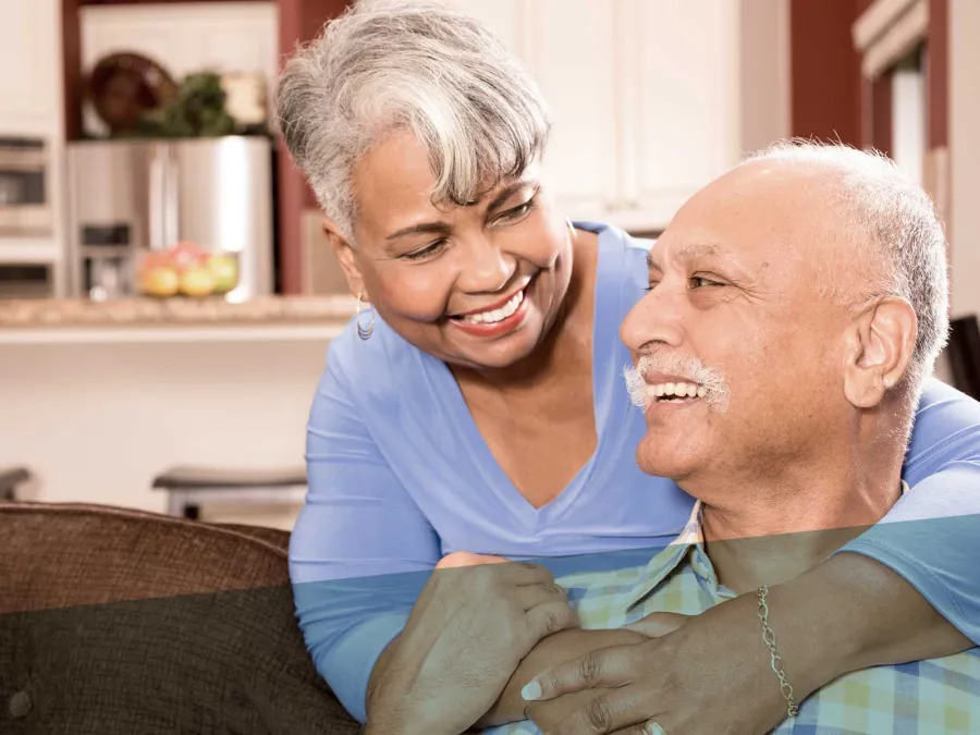 a man and a woman smiling