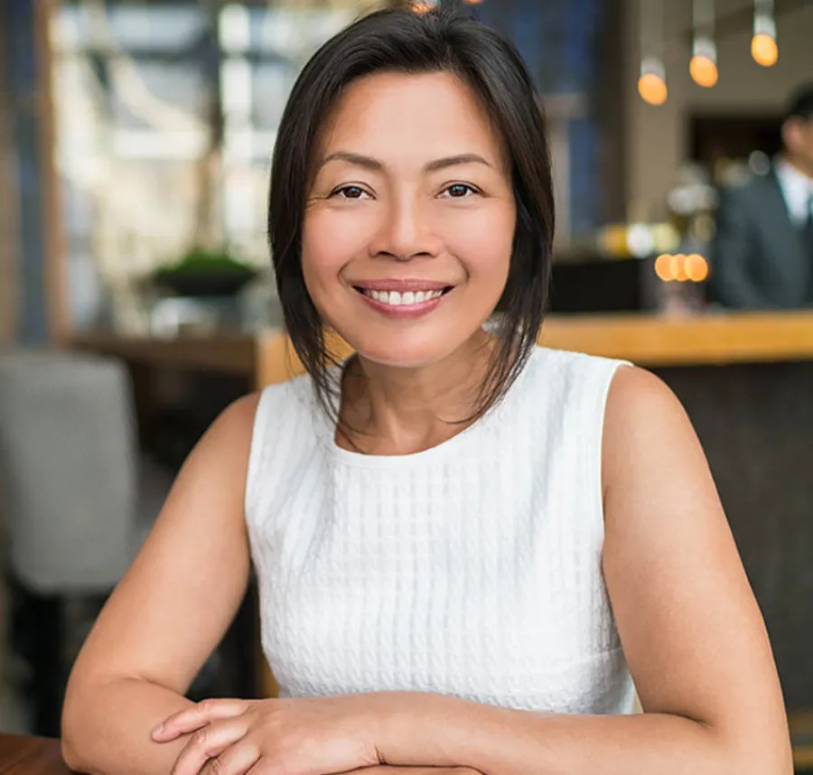 a woman smiling at the camera