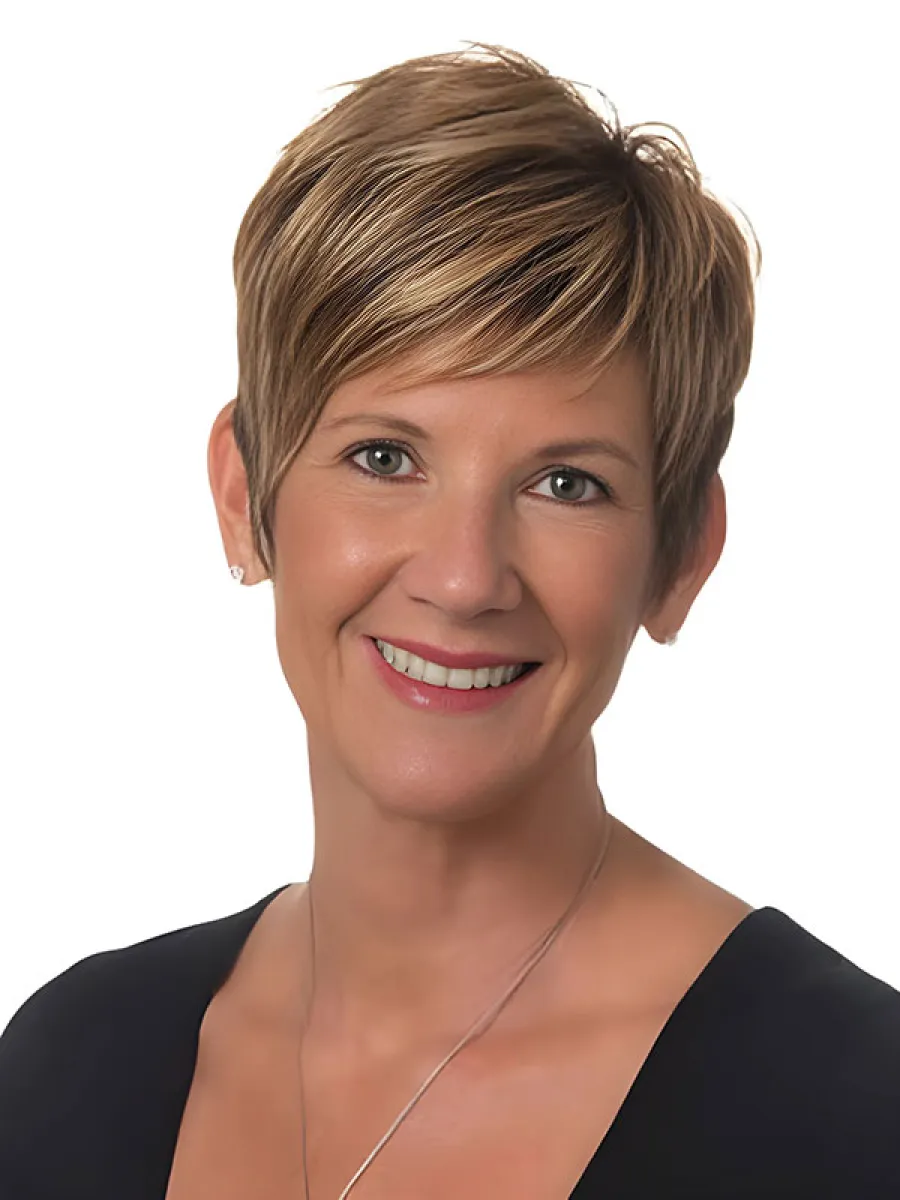 a woman smiling for the camera