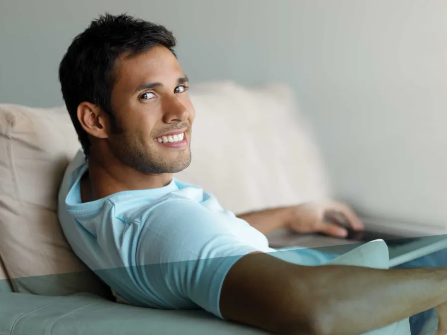 a person sitting on a couch