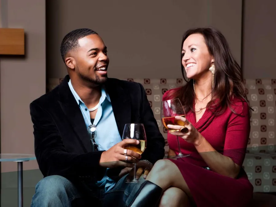 Marcus Thomas et al. holding wine glasses