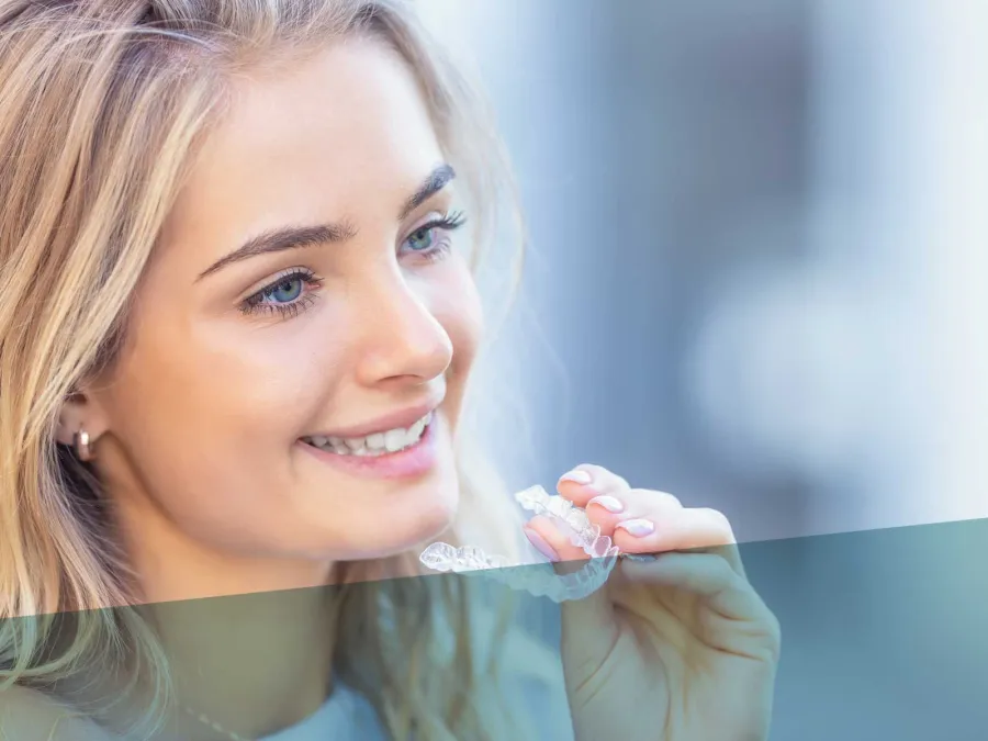 a woman brushing her teeth