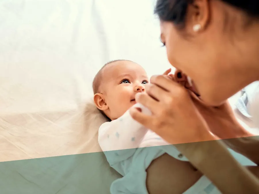 a person holding a baby