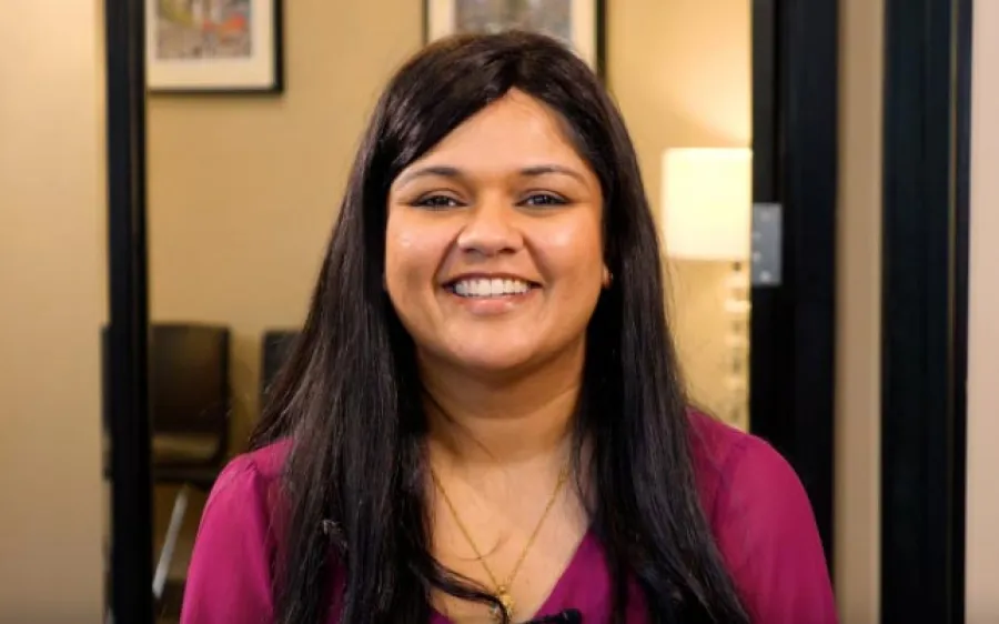 a woman smiling for the camera