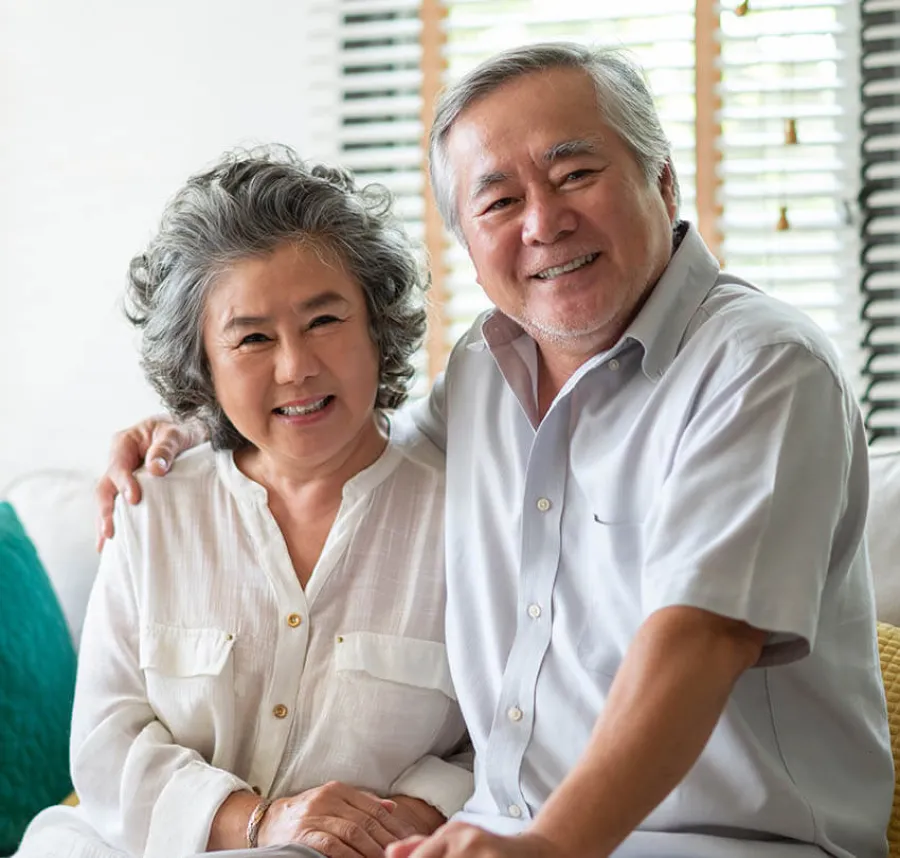 a man and a woman smiling