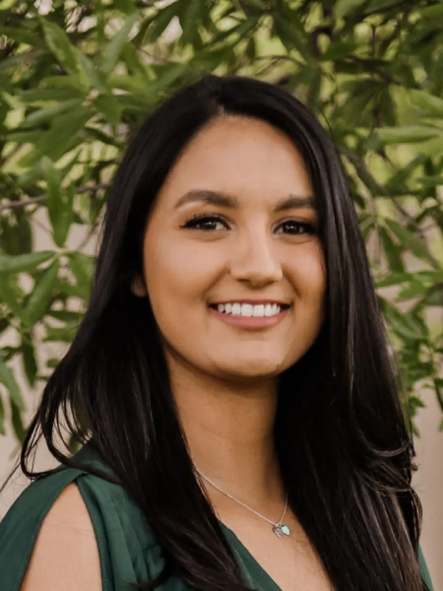 a woman smiling for the camera