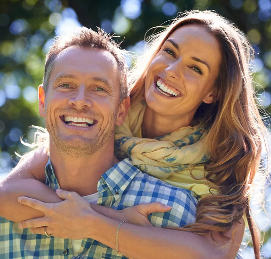 a man and woman embracing