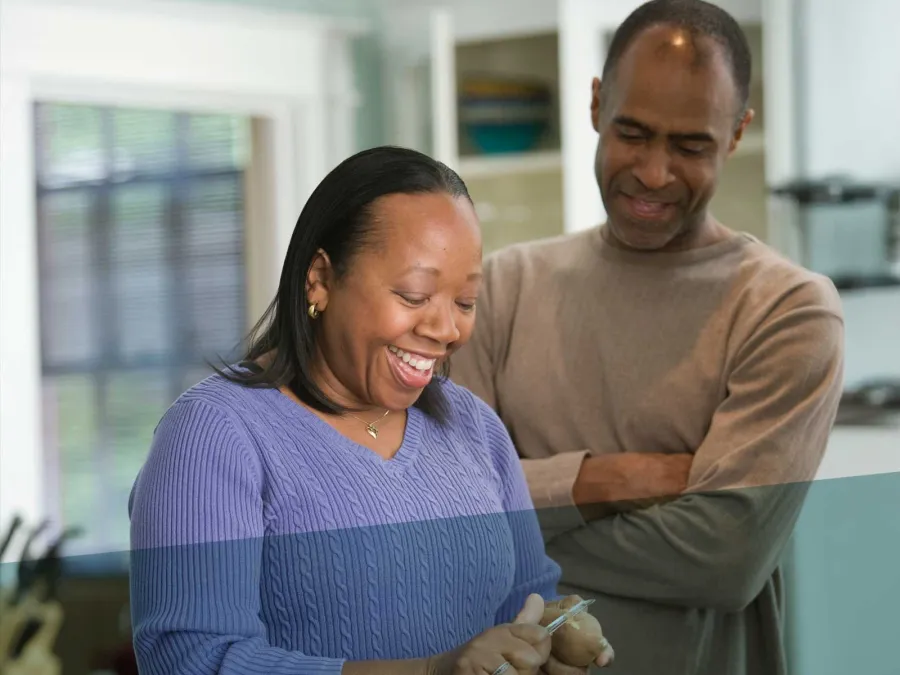 a man and a woman smiling