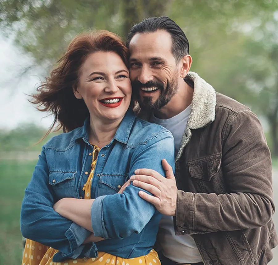 a man and woman embracing
