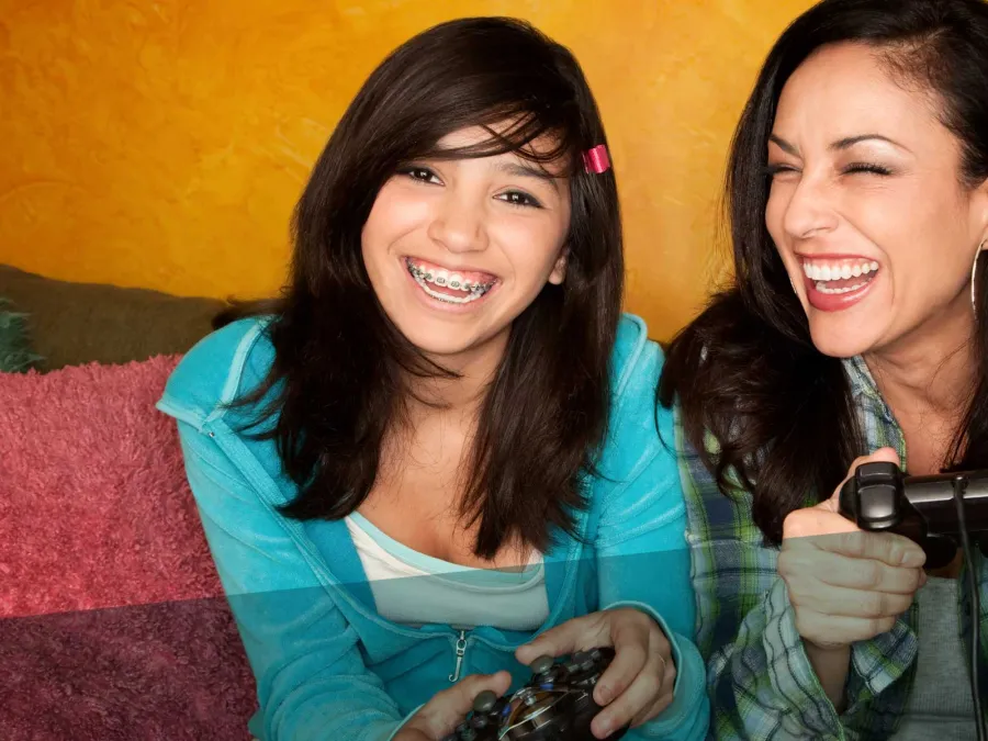 a couple of women smiling