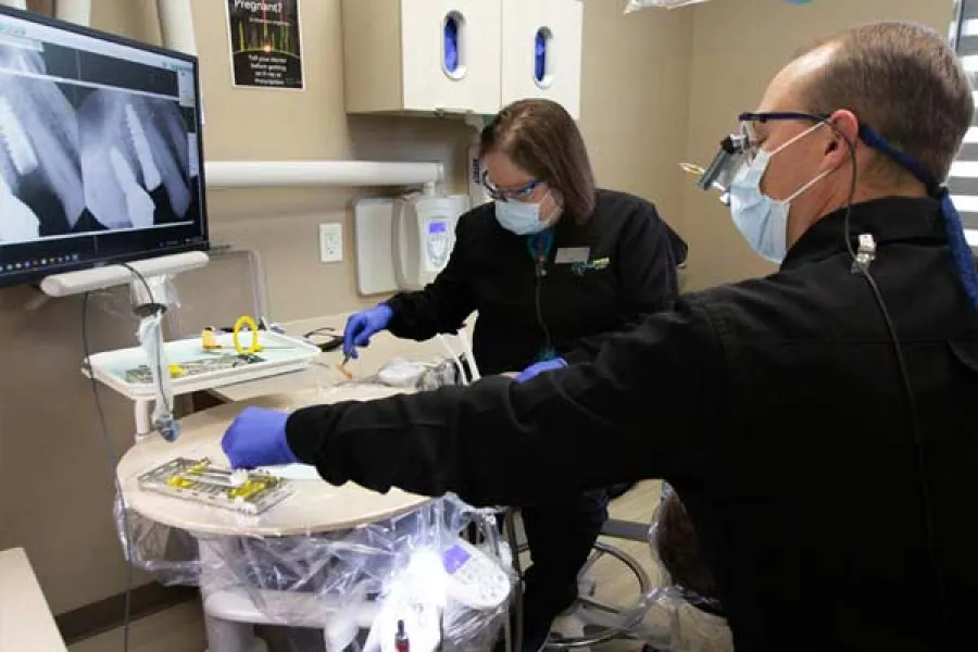 a man and a woman in a lab