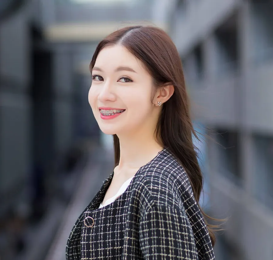 a woman smiling at the camera