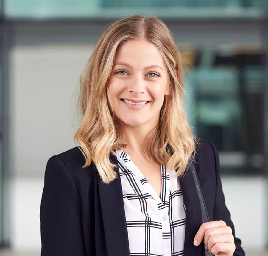 a woman smiling at the camera