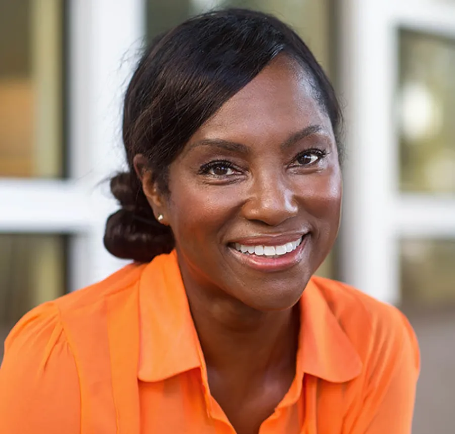a close-up of a woman smiling