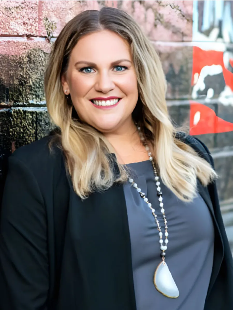 a woman smiling for the camera