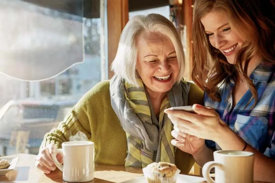 a couple of women smiling