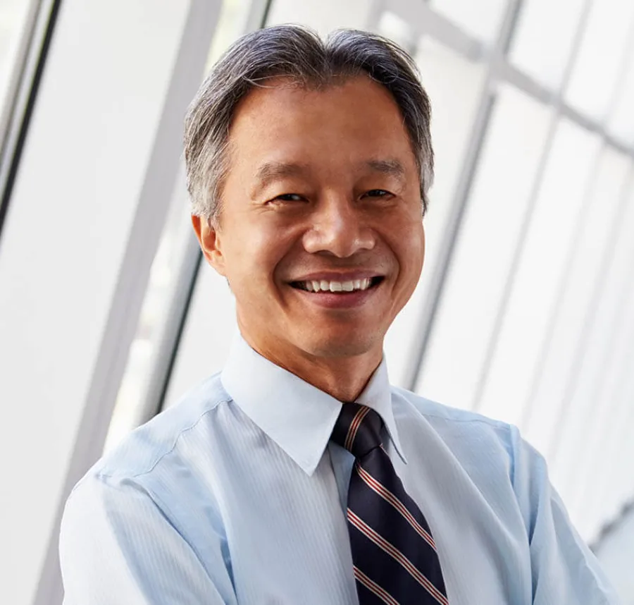 Larry Wang Parrish wearing a tie