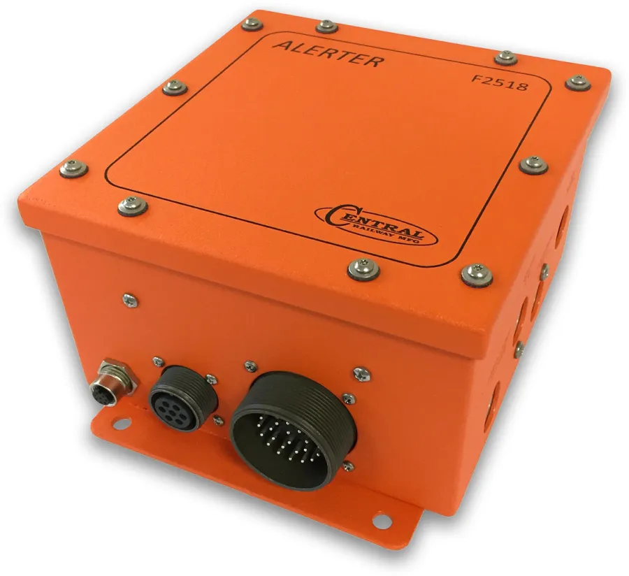 Orange industrial alert device box with connectors and Central Railway Mfg logo on top.