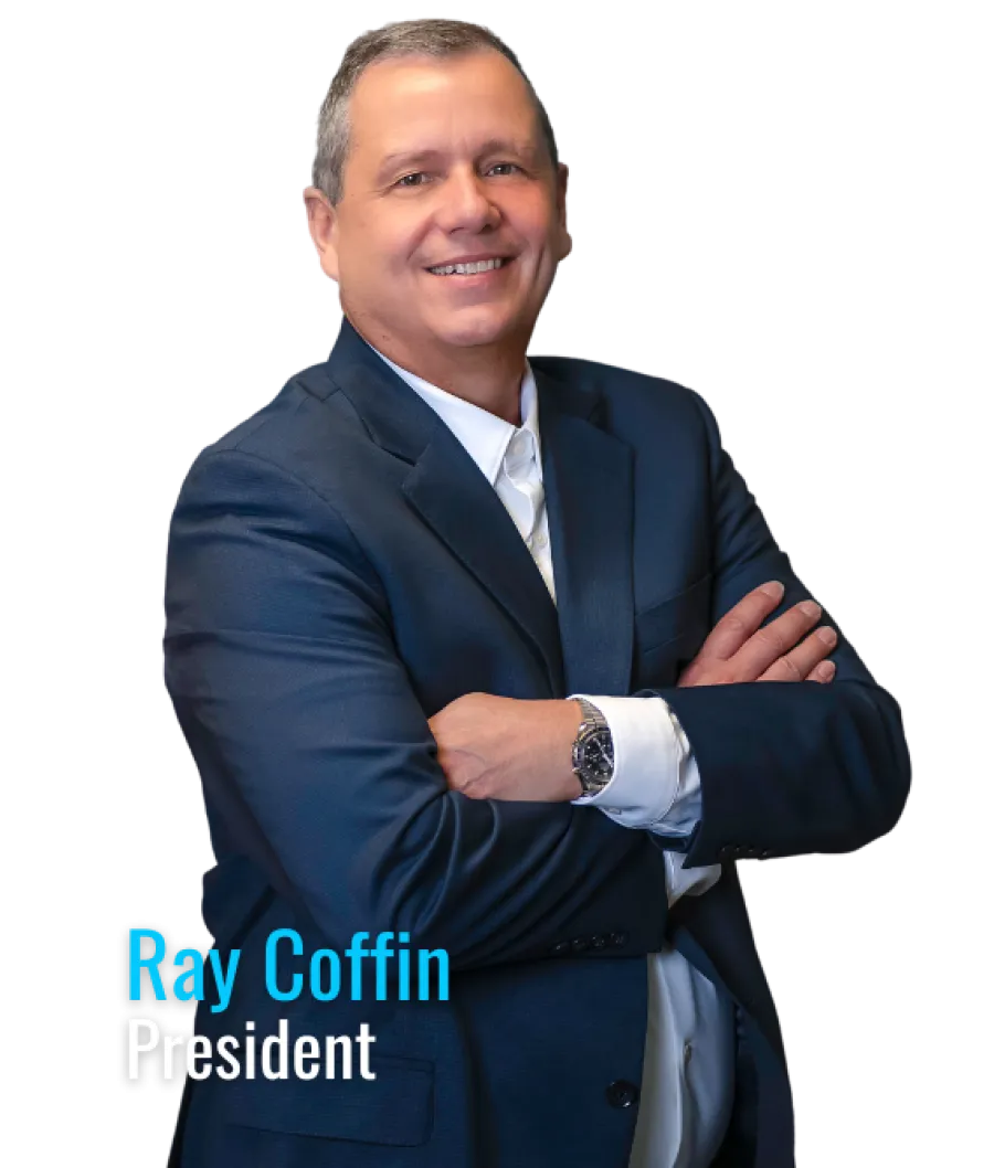 Smiling man in blue suit with arms crossed identified as Ray Coffin, President, against black background.