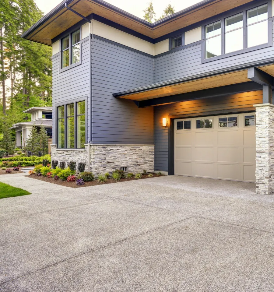 a house with garages and a driveway