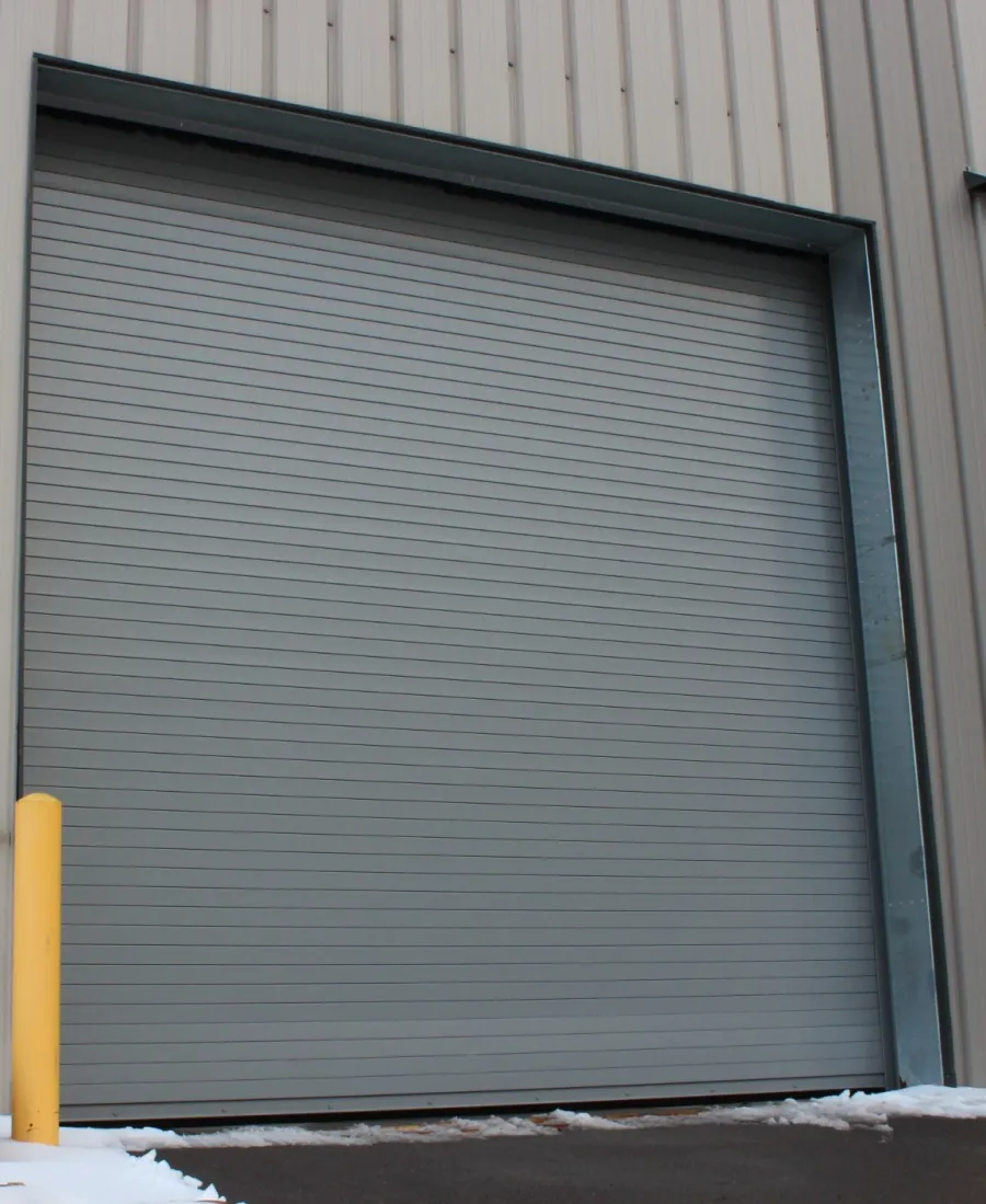 a garage door with a metal door