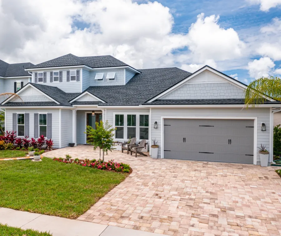 a house with a brick driveway