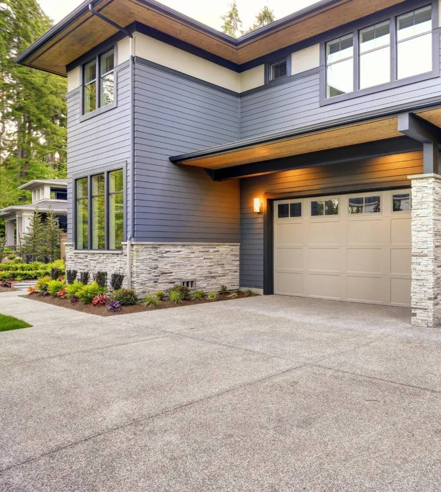 a house with garages and a driveway