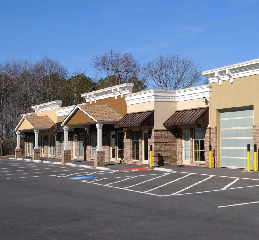 a building with a parking lot