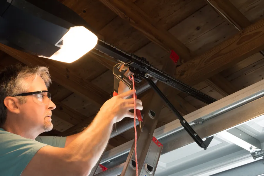 a person working on a garage door