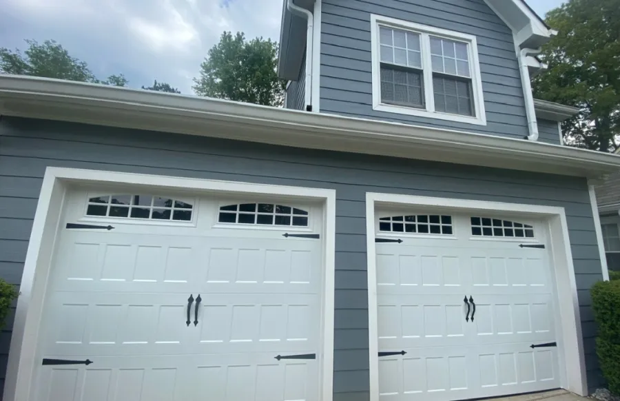 a garage door with a white garage