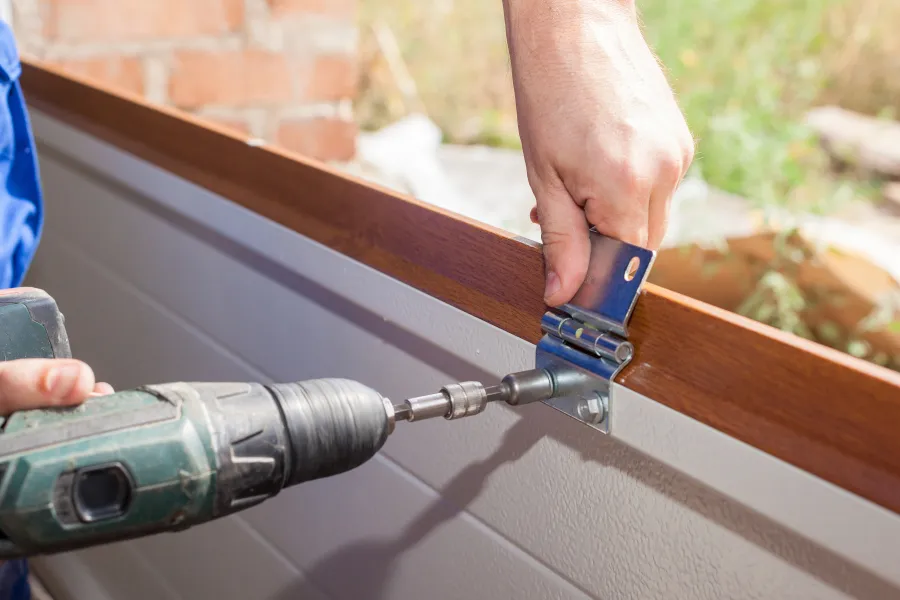 a person holding a metal bar