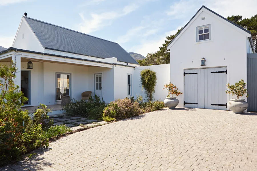 a house with a brick driveway