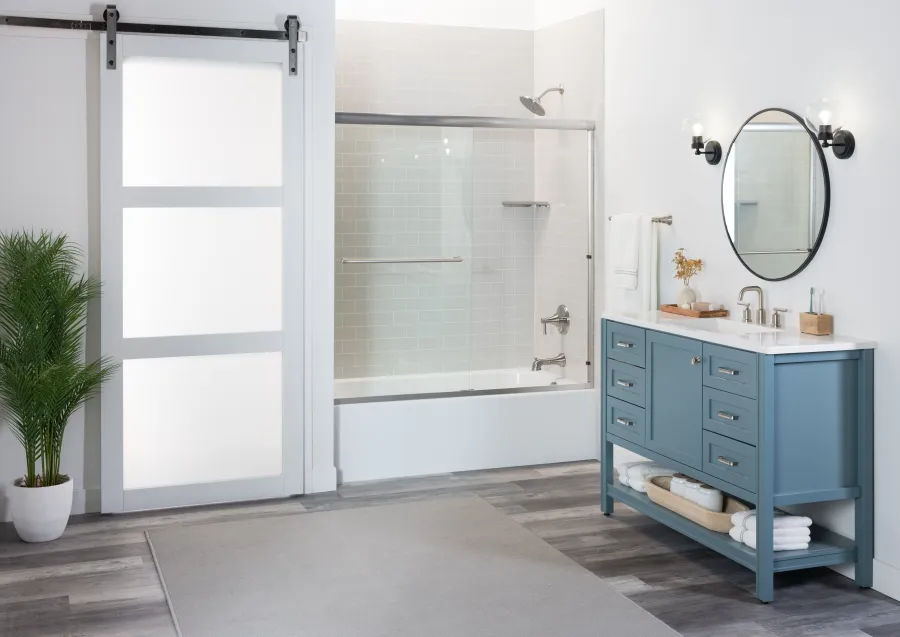 a bathroom with a blue cabinet