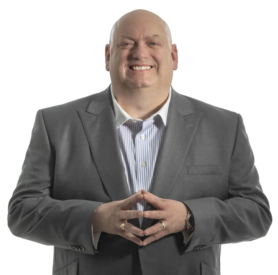 Smiling bald man in a gray suit with hands together in a business gesture, isolated on white background