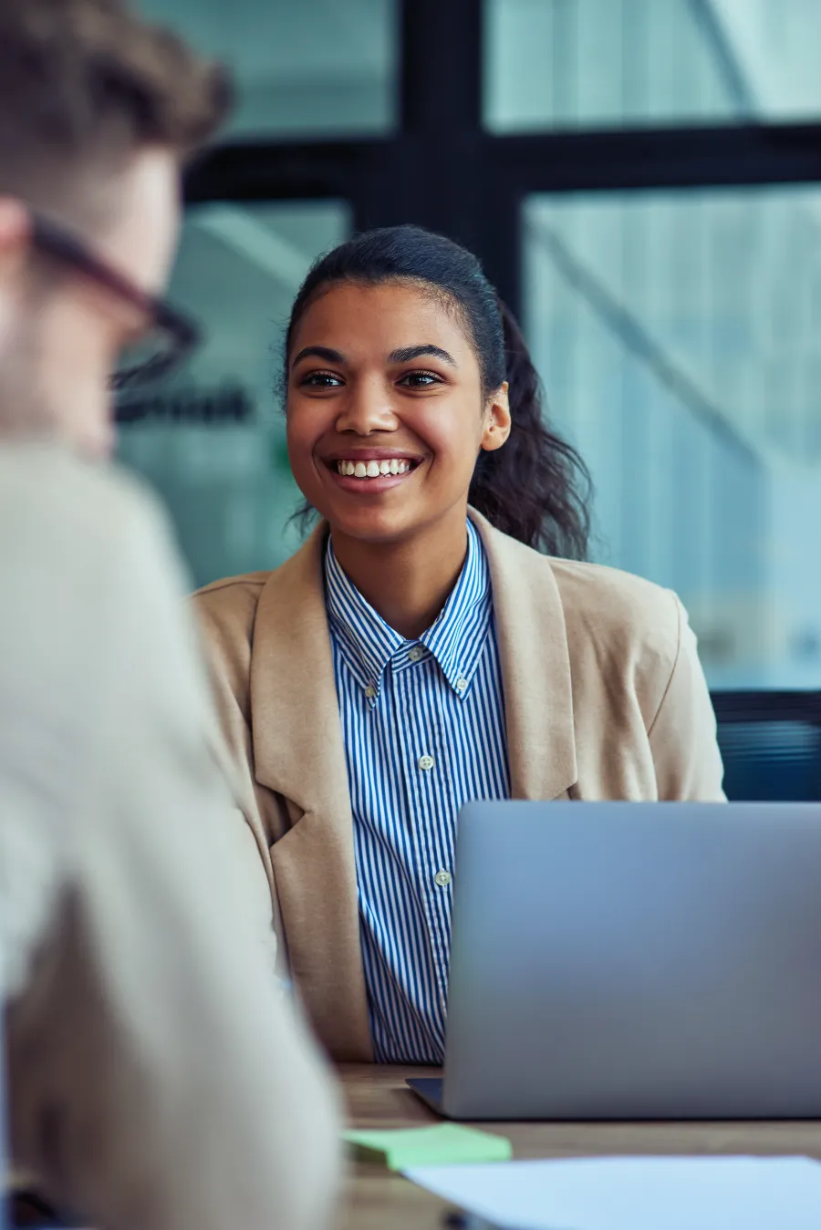 a woman smiling at a man