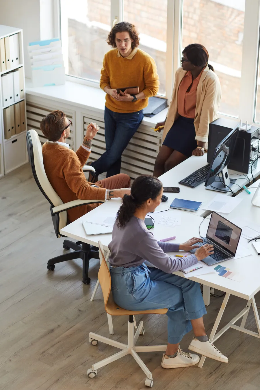 a group of people in an office