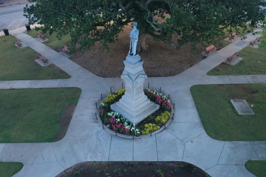 a statue in a cemetery