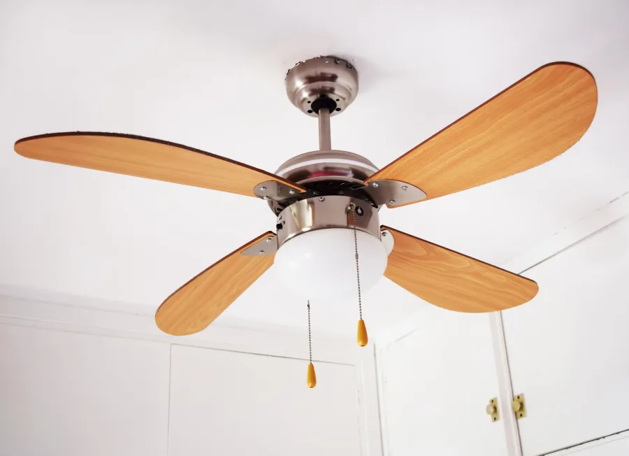 a ceiling fan with a light fixture