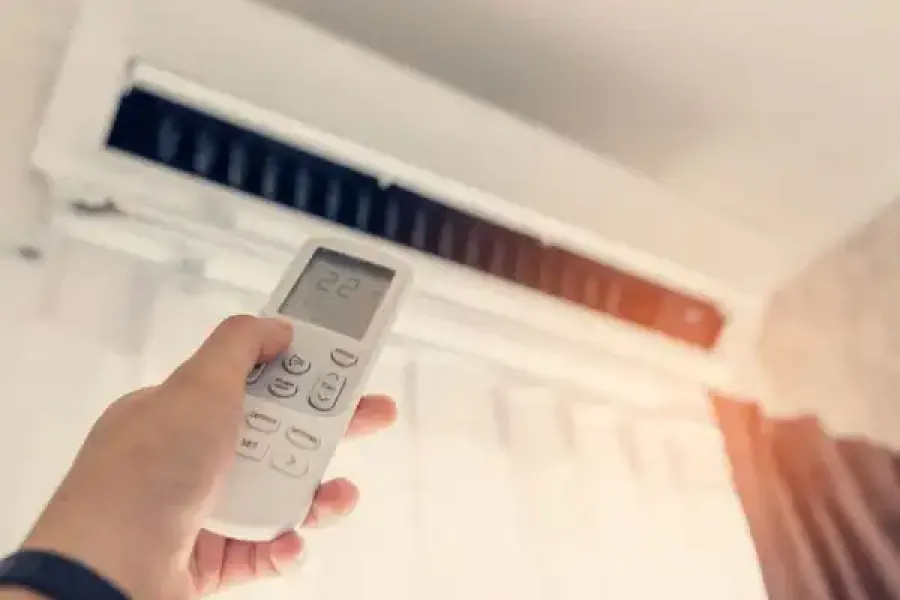 a person holding a remote control