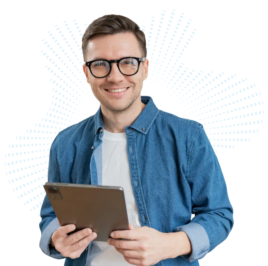 Smiling man in glasses holding a tablet, with a digital blue background pattern.