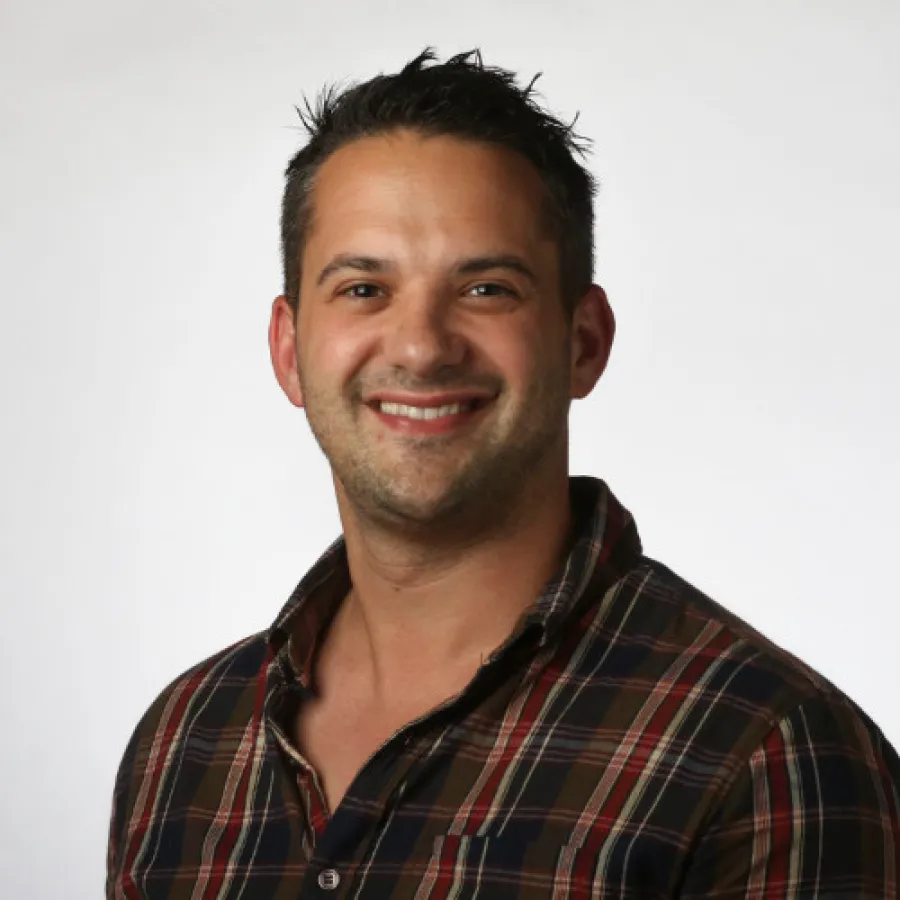 a man smiling for the camera