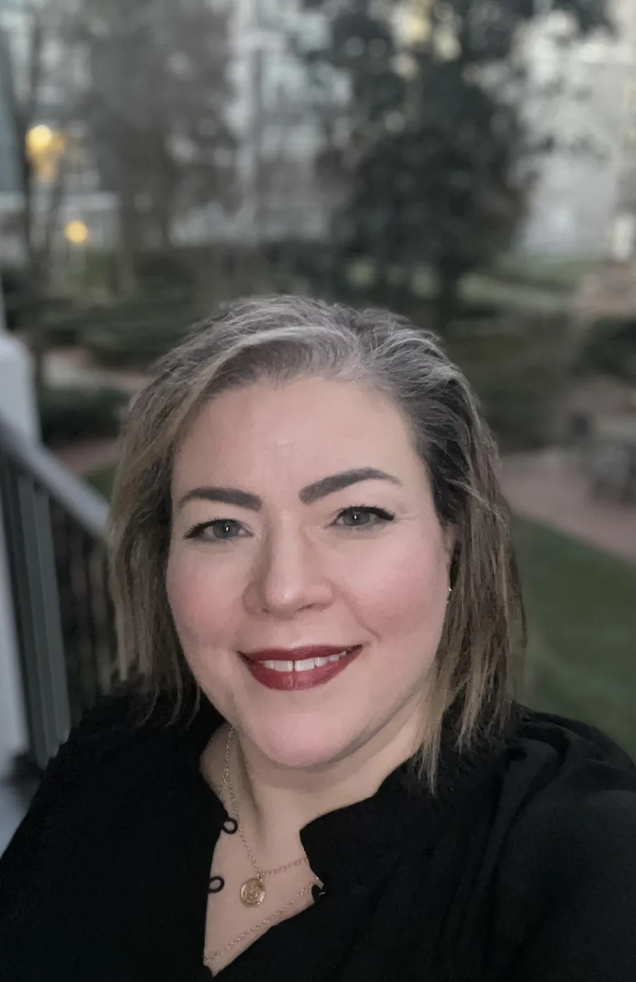 a woman smiling for the camera