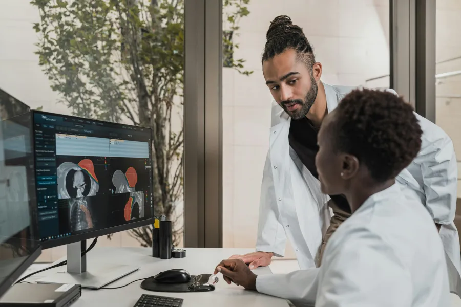 a man showing something on the computer
